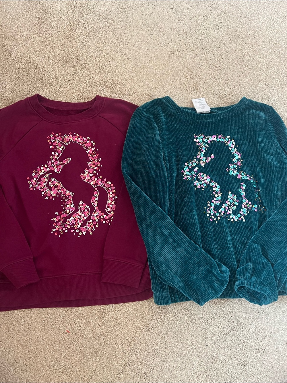 5/$25 two unicorn tops/sweatshirt